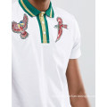 Embroidery Polo Shirt with Bird Embroidery and Metallic Tipped Collar